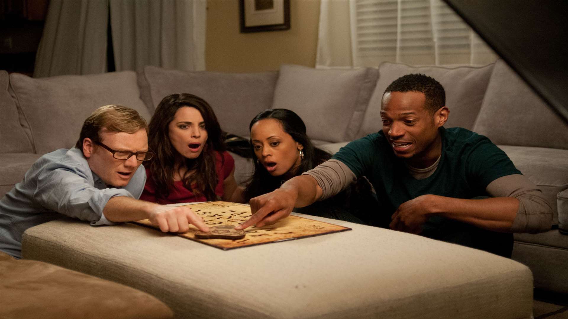A Haunted House with Andrew Daly as Steve, Alanna Ubach as Jenny, Marlon Wayans as Malcolm and Essence Atkins at Kisha. Picture: PA Photo/Handout.