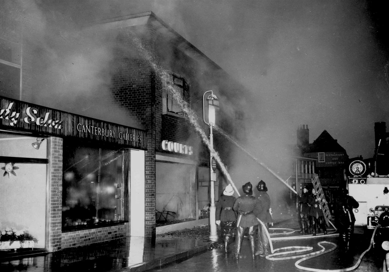 A blaze at Courts furniture showrooms and store in Burgate in 1964 (Picture: Images of Canterbury)