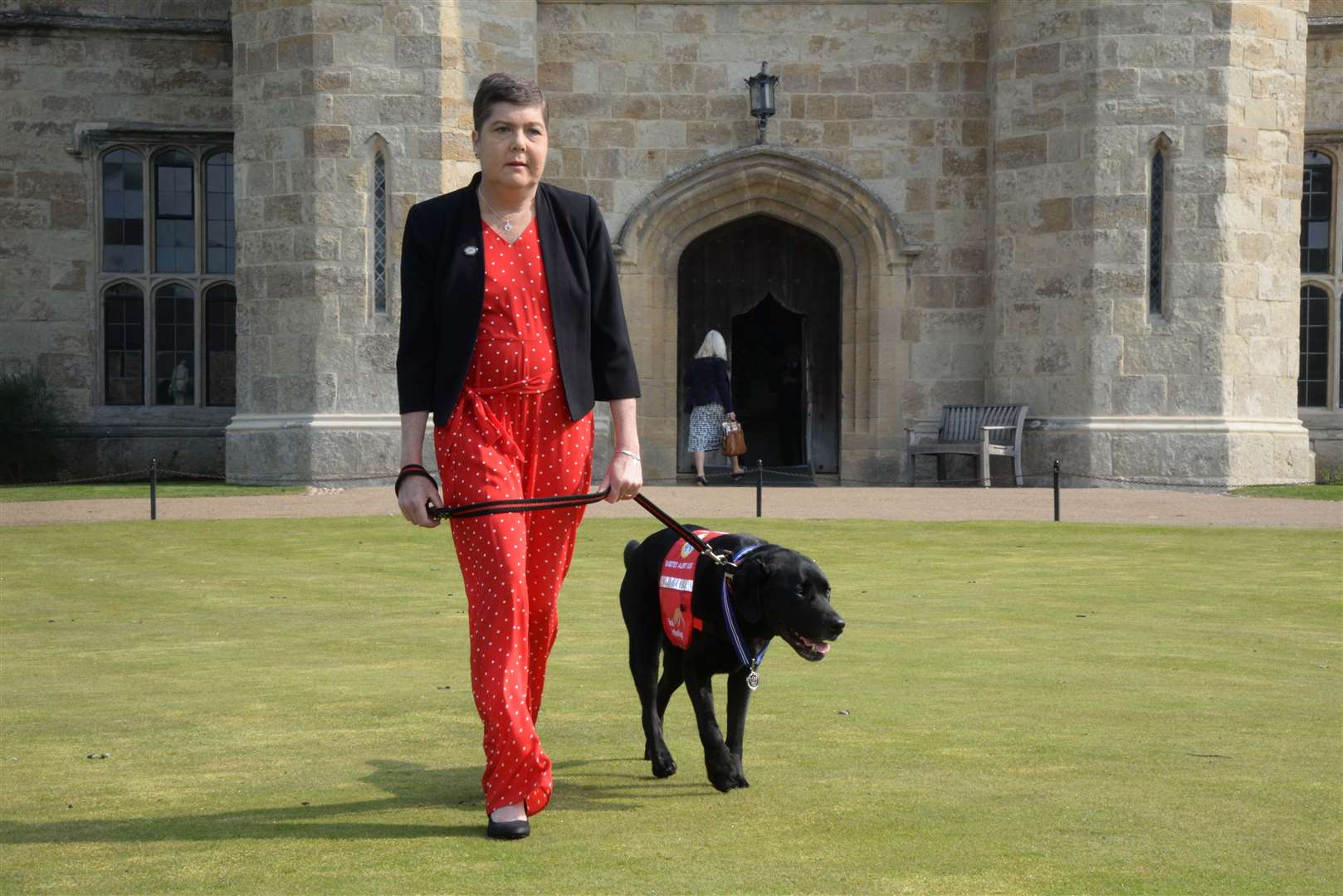 Pal the medication detection dog with owner Claire Pearson at Leeds Castle on Wednesday. Picture: Chris Davey... (8747518)