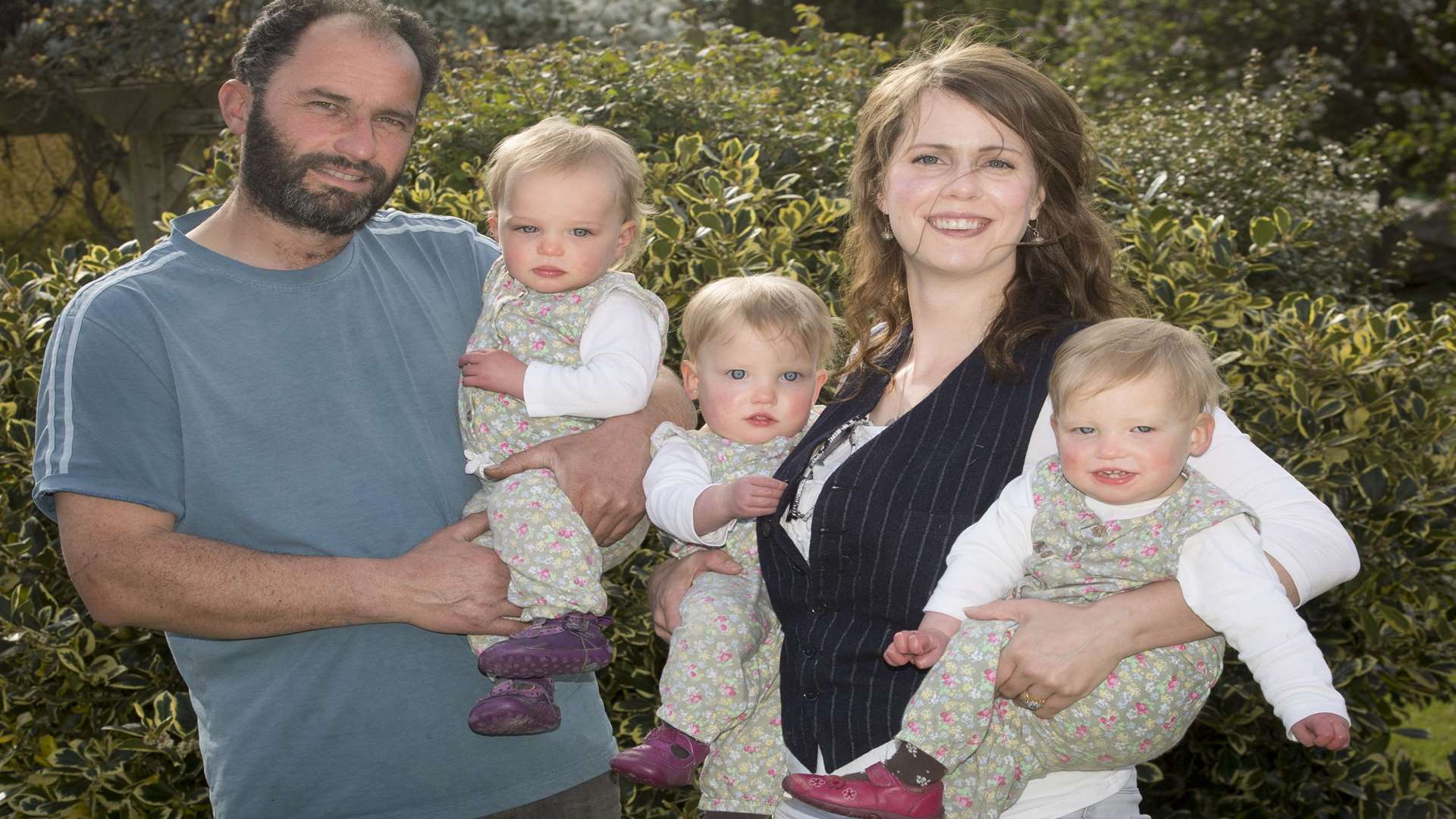 Jolene Broad and her husband Tony with their triplets