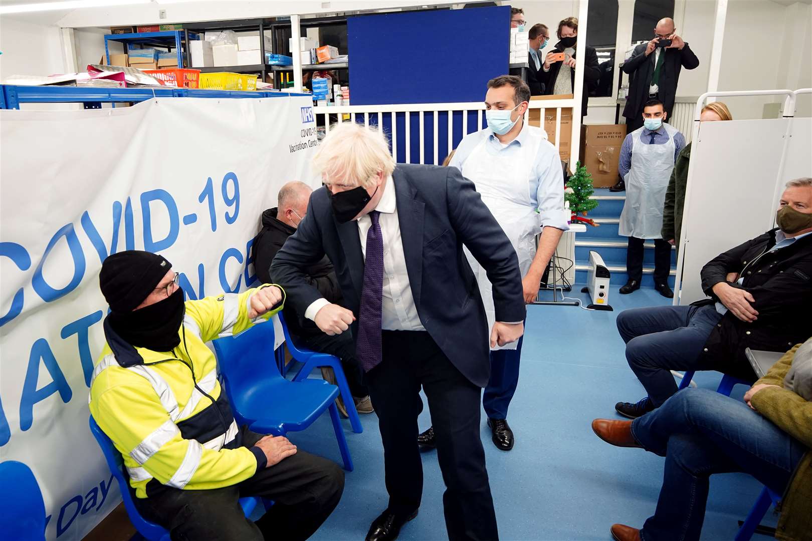 Prime Minister Boris Johnson campaigned in North Shropshire, including meeting people waiting to receive their Covid-19 booster vaccines (Peter Byrne/PA Wire)