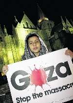 Young Ismail Zubair, 10, took part in a vigil for Gaza at Rochester Cathedral