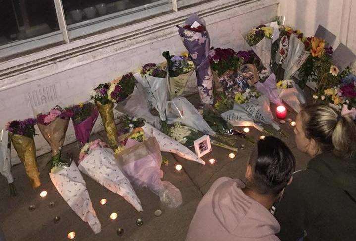 Friends have laid flowers and messages in tribute to Ellis. Picture: Ollie C-P