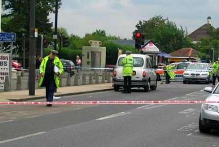 Police at the scene of the collision on Monday afternoon