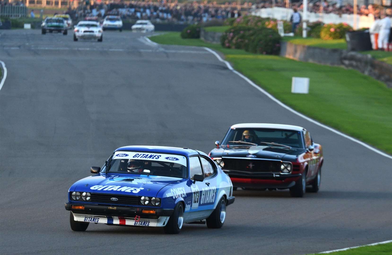 Hill leads Craig Davies, in his Ford Mustang Boss, at the Goodwood Members' Meeting