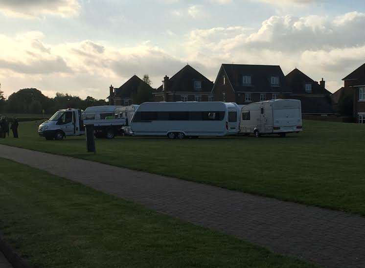 About six caravans are parked up