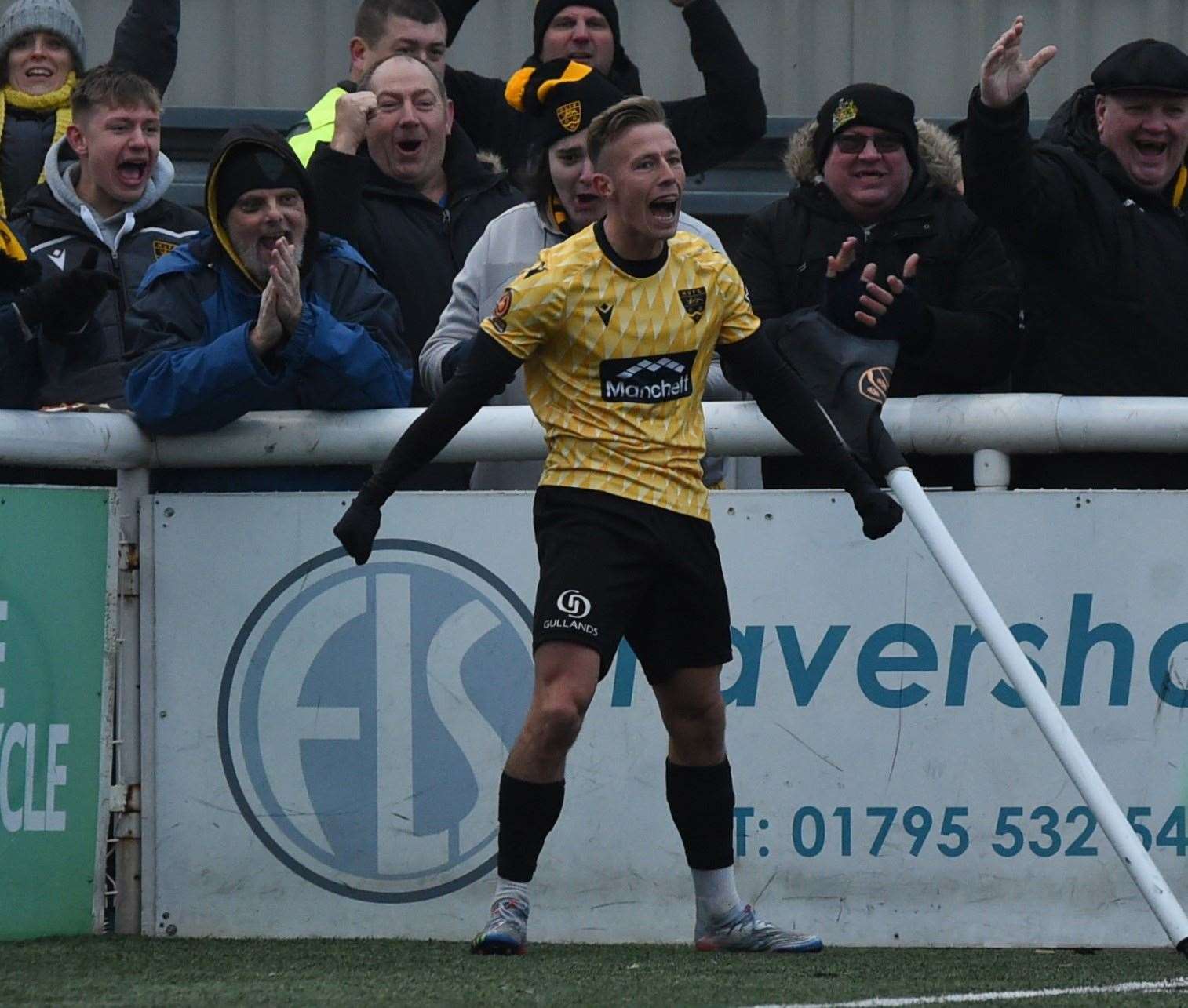 Maidstone midfielder Sam Corne celebrates his equaliser against Barrow. Picture: Steve Terrell