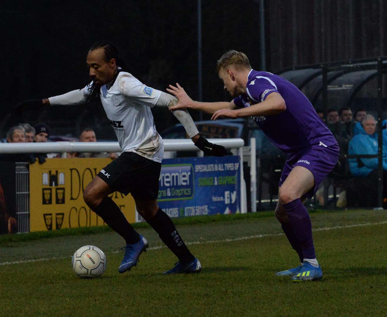 First-half action from Crabble as Ricky Modeste gets down the right, tracked by George McLennan Picture: Chris Davey