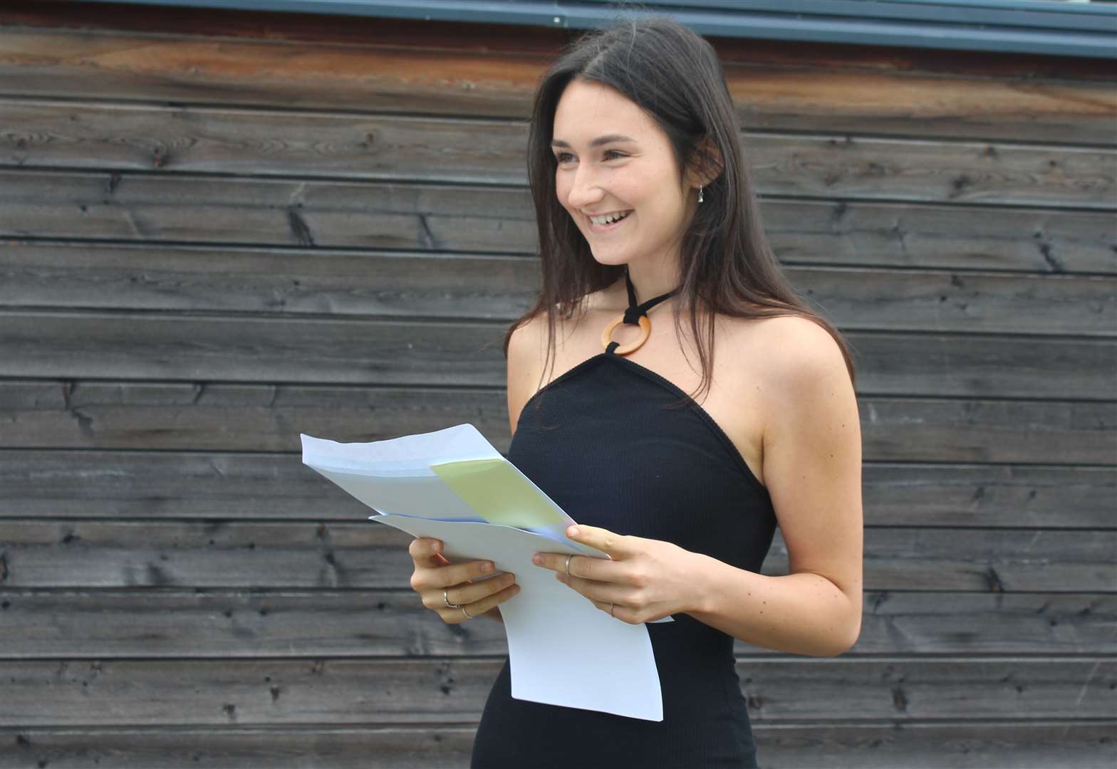 A pupil at Sittingbourne's Highsted Grammar School for Girls learns of her GCSE results on Thursday