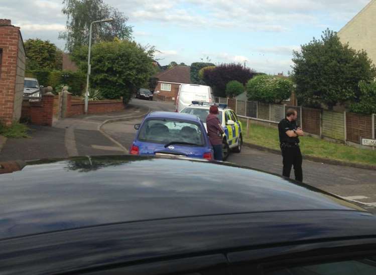Police road block on Whitehill Road as they investigate the bomb found in a boot in St Mary's Close