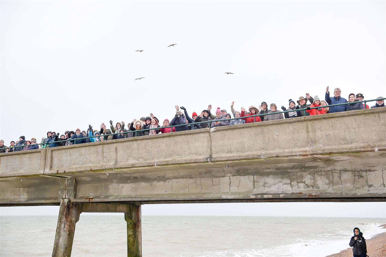 Spectators line the Pier to watch dippers dive in the sea on Boxing Day Picture: Alan Langley