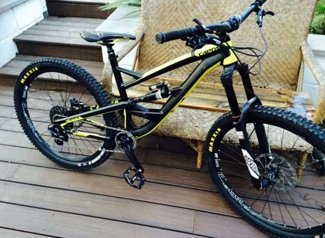 A black and yellow Capra mountain bike was also taken