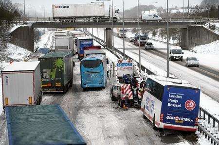 Traffic disruption on the M20 at Junction 11 as snow hits. Picture: Mark Jones