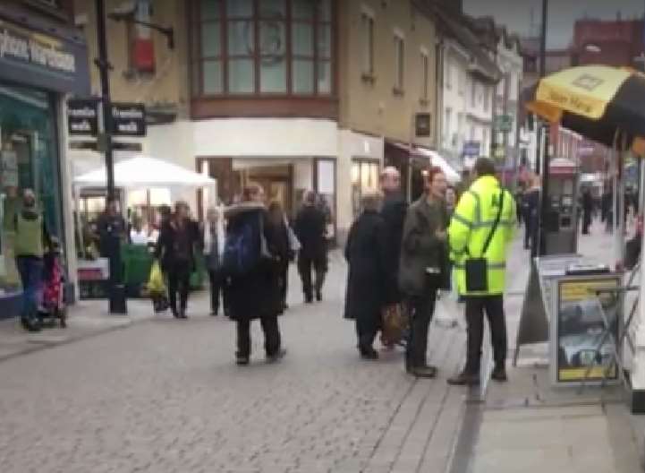 Man abuses an AA employee in busy high street