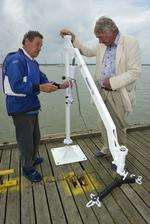 Tim Bell, left, from the Isle of Sheppey Sailing Club, and Geof Reed examine the hoist to allow very disabled sailors to access the boats