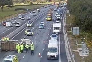 An overturned trailer on the M25, causing delays for Kent motorists