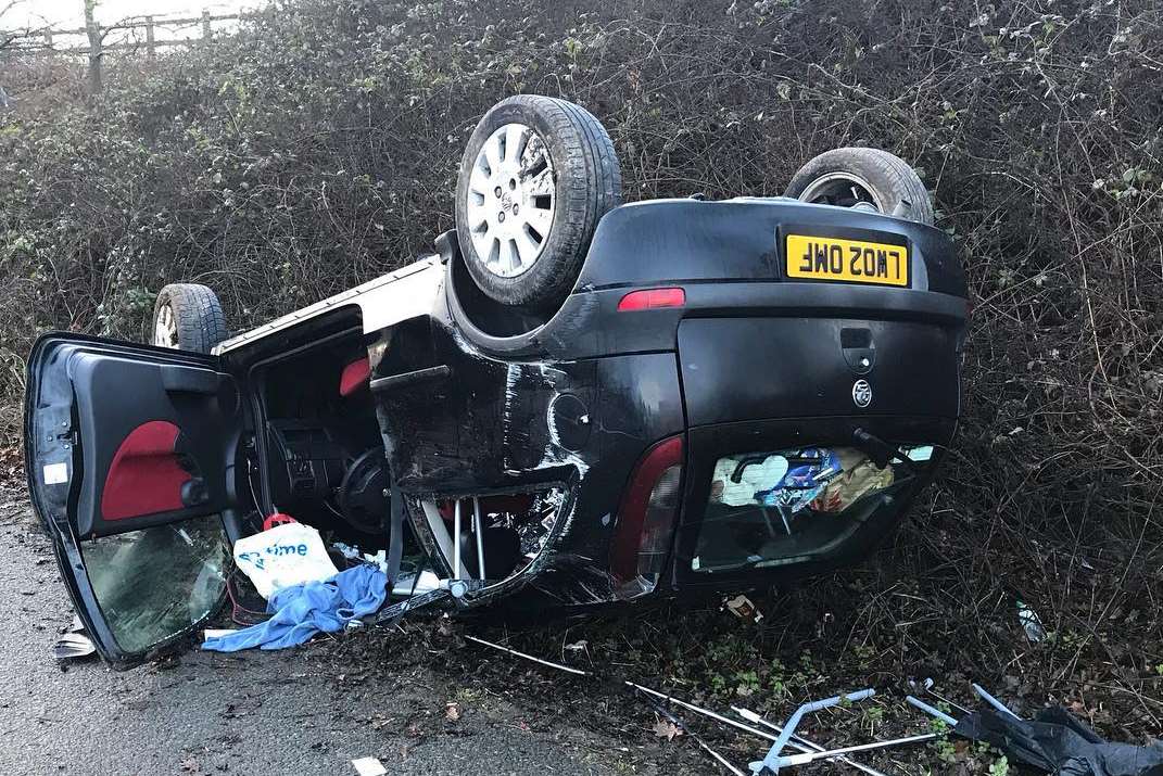 The car was left wrecked by the side of the motorway.