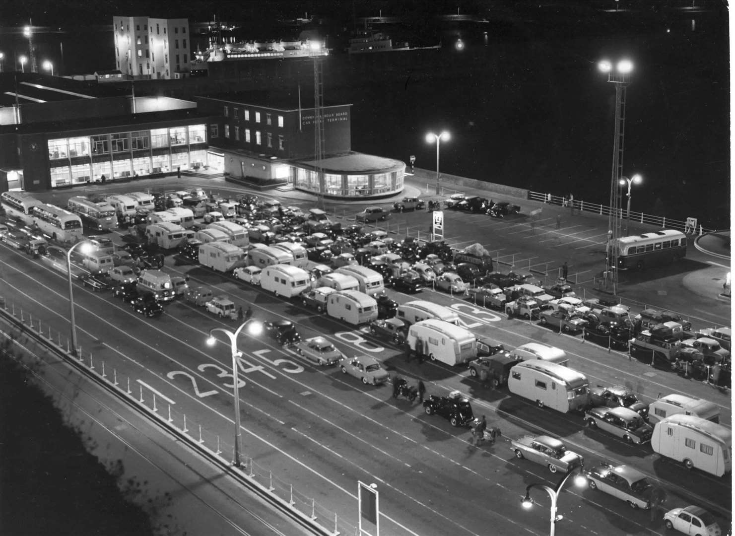 Queues at the Port of Dover 60 years ago this month, with cars and caravans pictured waiting to board ferries in August. 1962. Picture: Ray Warner Ltd