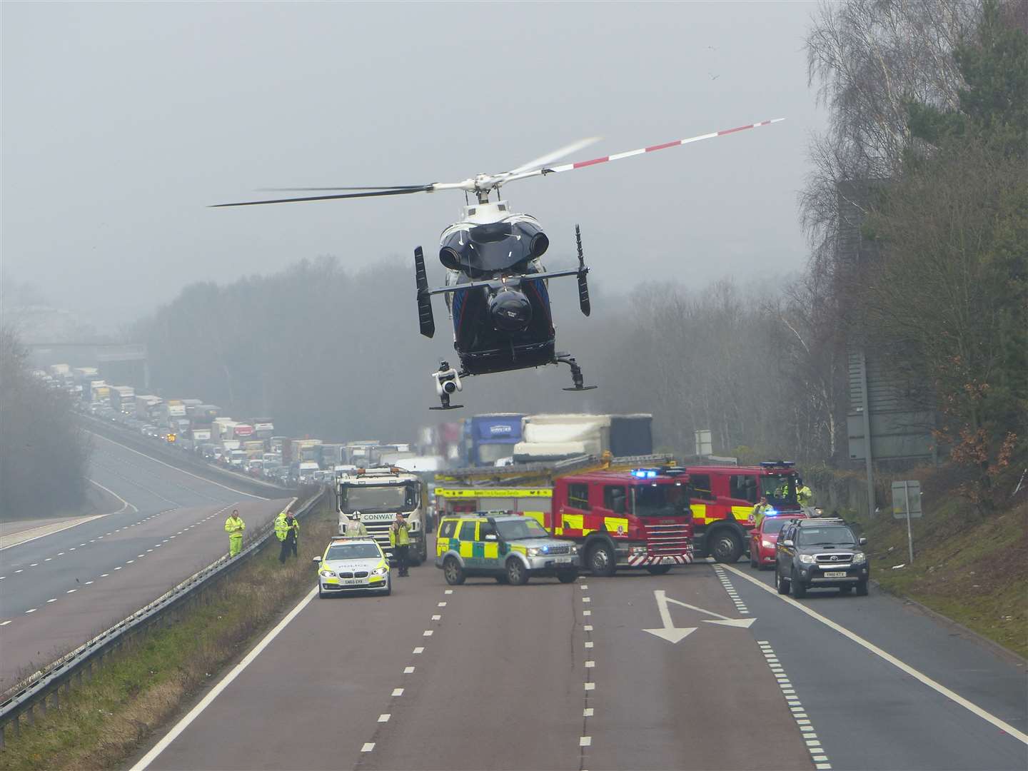 The air ambulance taking off from the scene. Picture: Andy Clarke