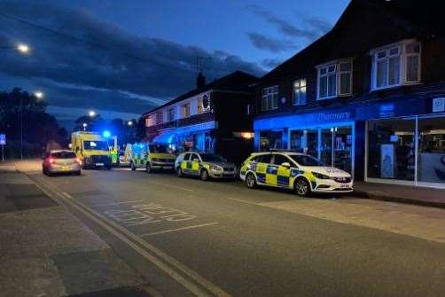 Police outside the pharmacy on St John's Road in Swalecliffe. Picture James McKinven