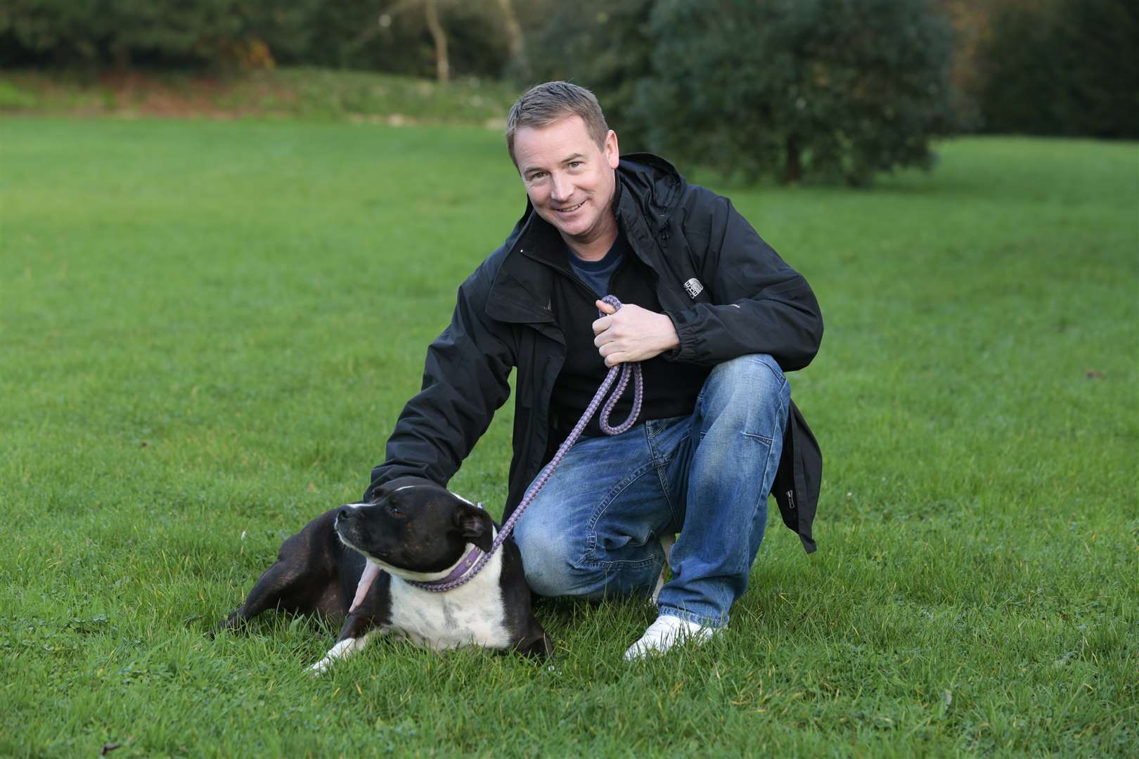 Richard Cummins, who fosters dogs for the RSPCA's Headcorn and Leybourne branches, walks Mollie the dog