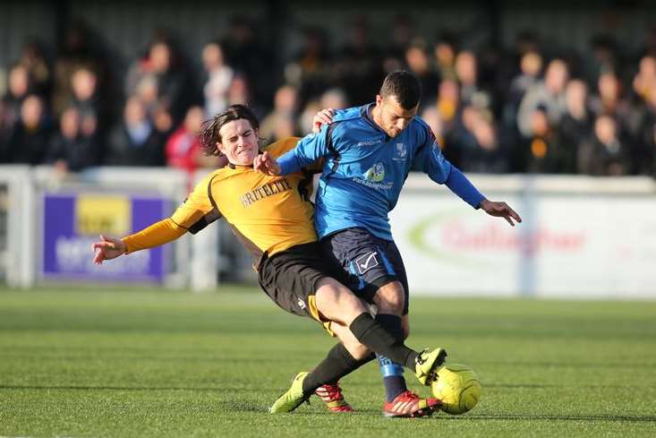 Luke Rooney gets stuck in against Wingate Picture: Martin Apps