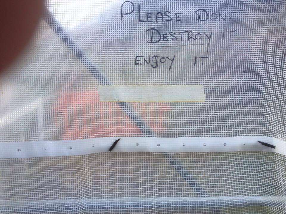 Sign saying: please don't destroy it, enjoy it