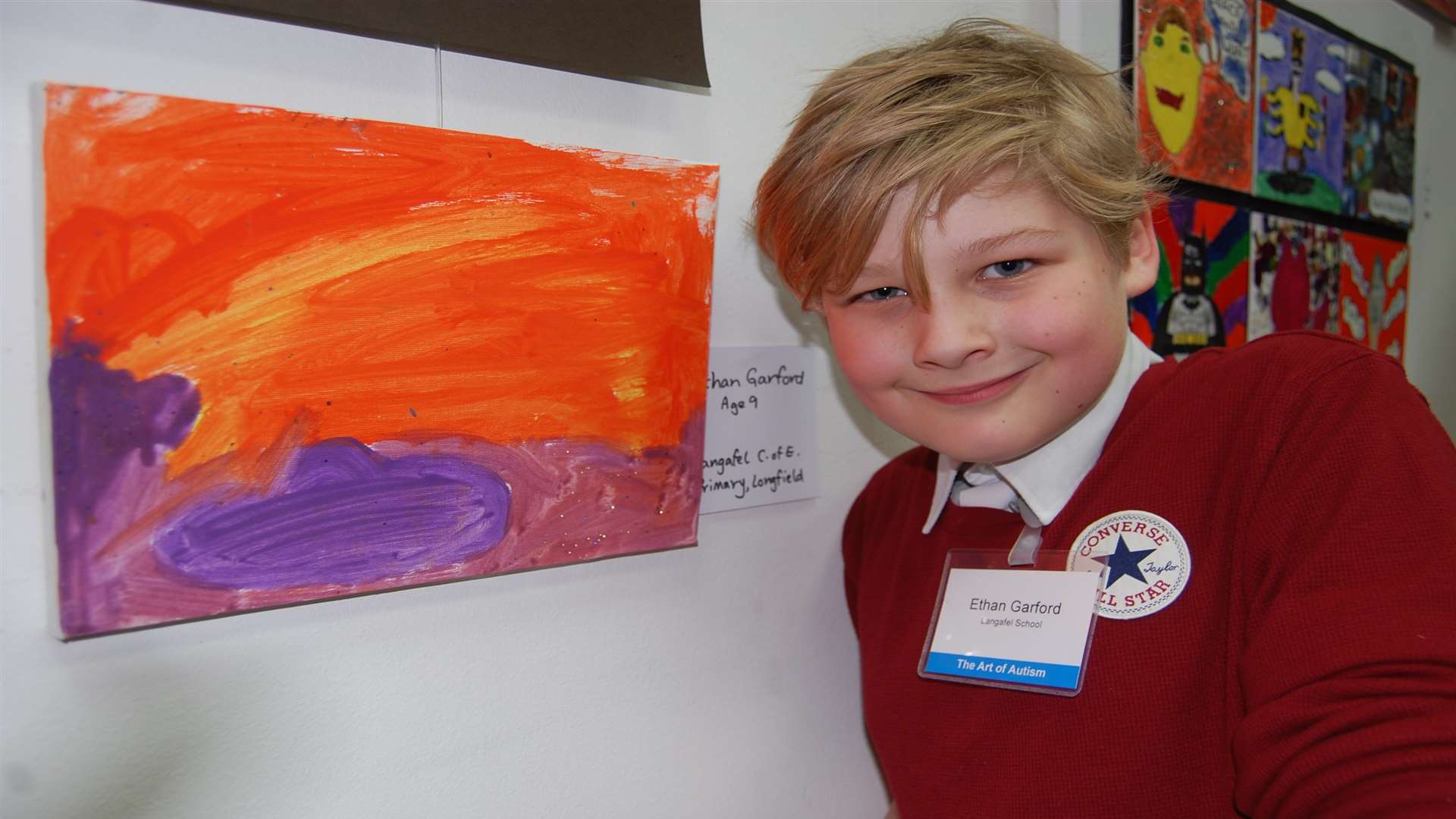 Ethan Garford, nine, with his work