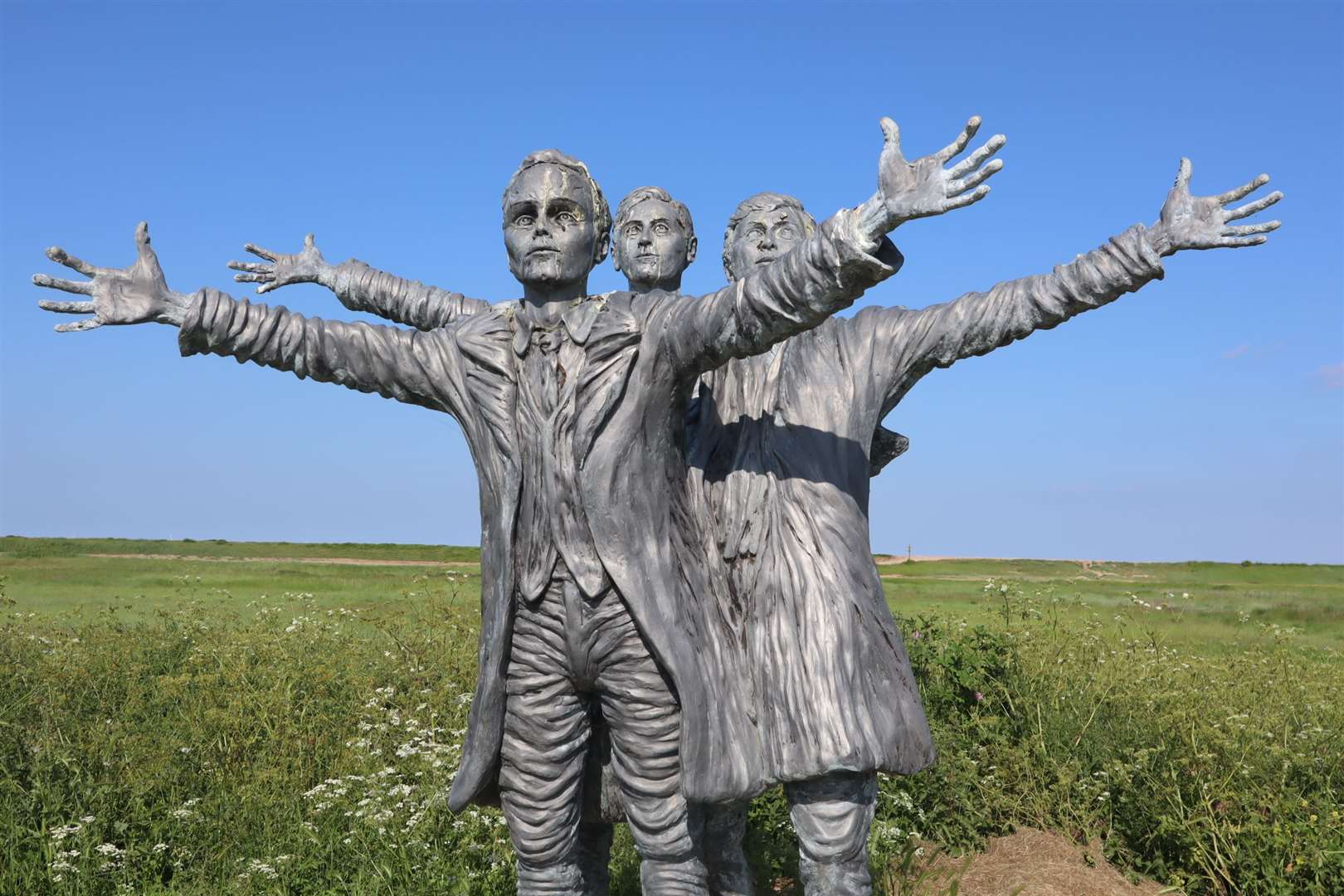 Statue to British aviation pioneers the Short Brothers Oswald, Eustace and Horace who set up the first aircraft factory on the Isle of Sheppey. The statue at Shellness by Muswell Manor is dedicated to the "magnificent makers of flying machines."