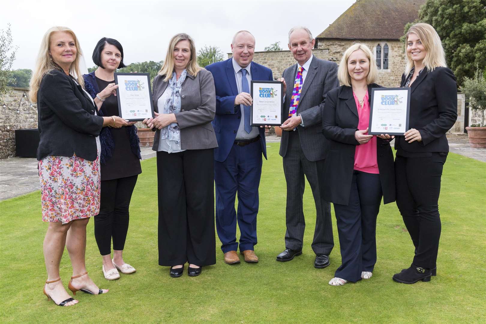 Kingfisher Primary and St Michael's RC Primary, both in Chatham, and Barton Junior School in Dover received Buster's Book Club Awards at a ceremony at Leeds Castle in Maidstone organised by the KM Charity Team.