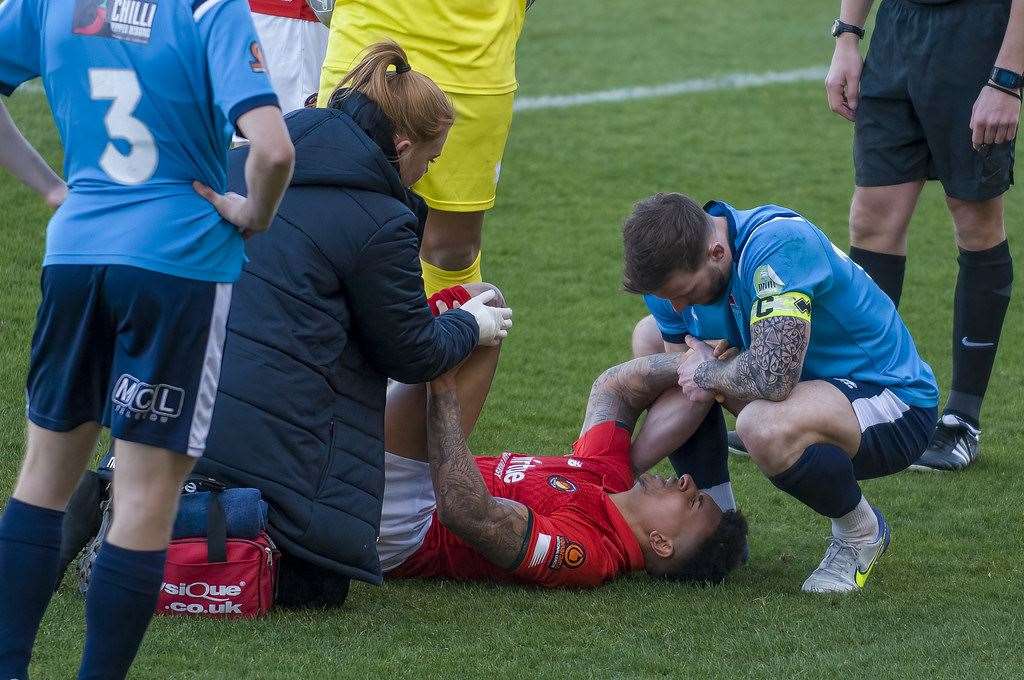 Ebbsfleet's Tobi Adebayo-Rowling gets treatment after being injured against Eastbourne. Picture: Ed Miller/EUFC (55422794)
