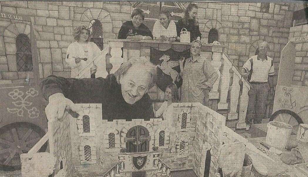 John Kingdon with a model of the castle he created, and behind him the real thing
