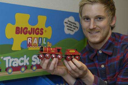 George Poole, from Folkestone-based BigJigs Toys, with a model train