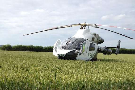 The air ambulance landed in a nearby cornfield