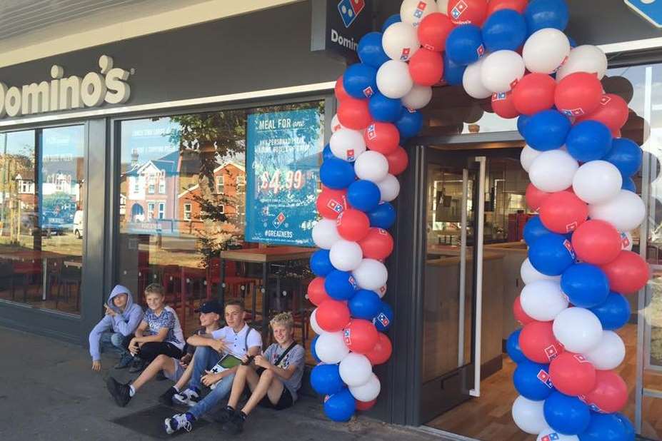 People waiting for free pizza as Kent's first Dominos dine-in prepares to open. Picture: Domino's