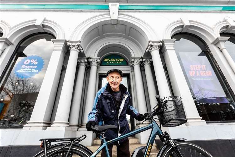 George Bailey with his new e-bike. Picture: Raleigh/Evans Cycles/PA