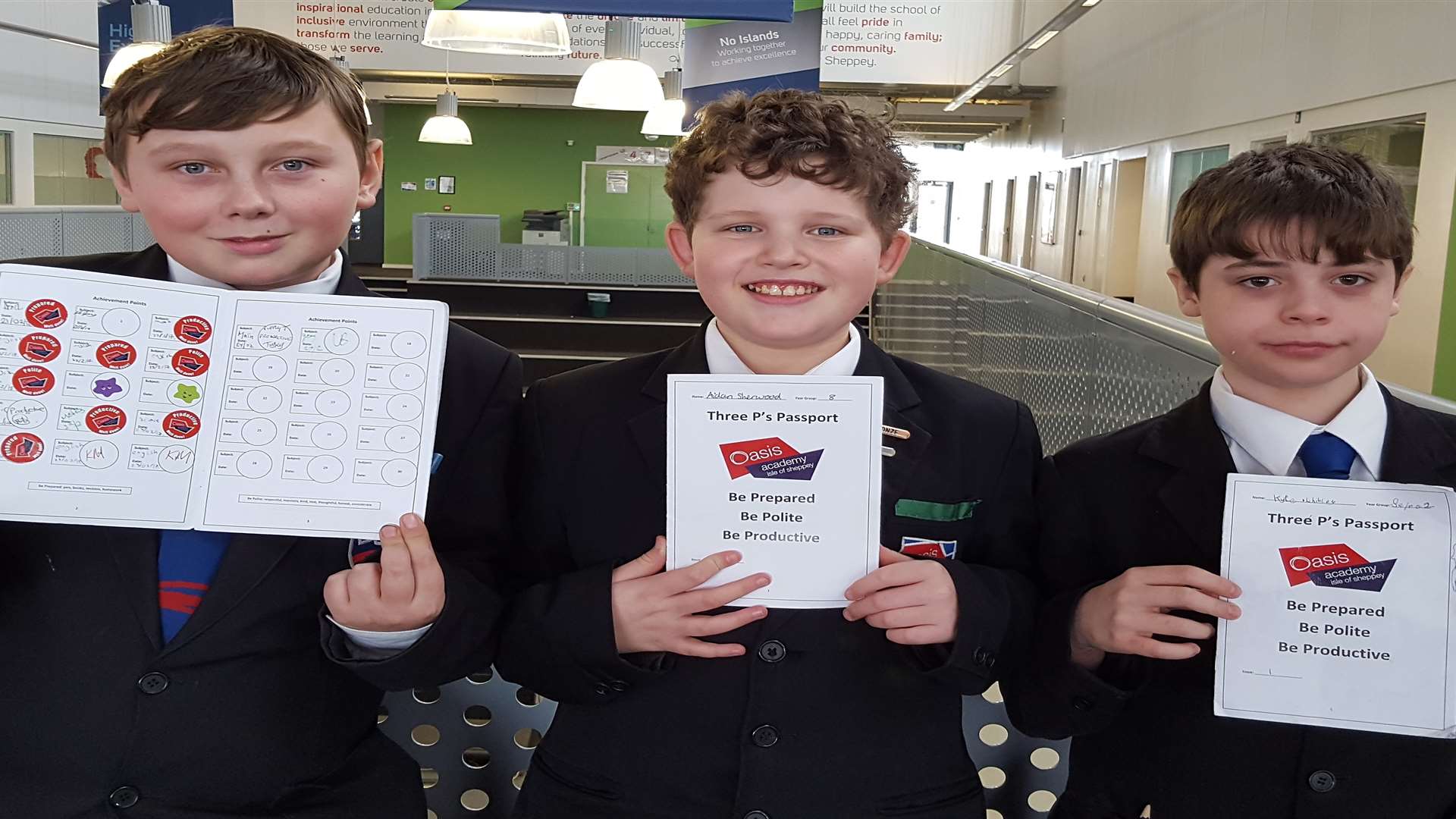 The passport has had a mixed reaction: Pupils Cody Hester, 13, Aidan Sherwood, 12, and Kyle Whibley, also 12