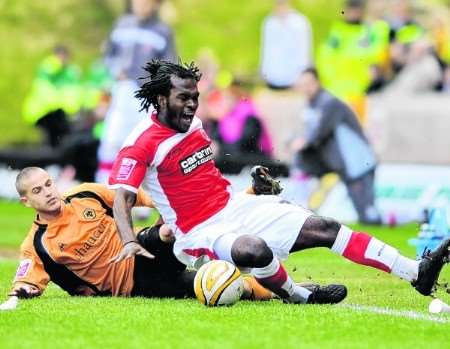 Charlton's Kelly Youga is brought down at Molineux. Picture: Barry Goodwin.