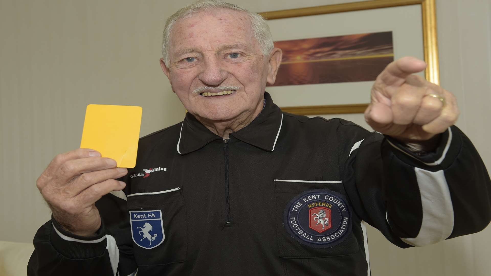 Ernie McGarvey has retired after 65 years of football