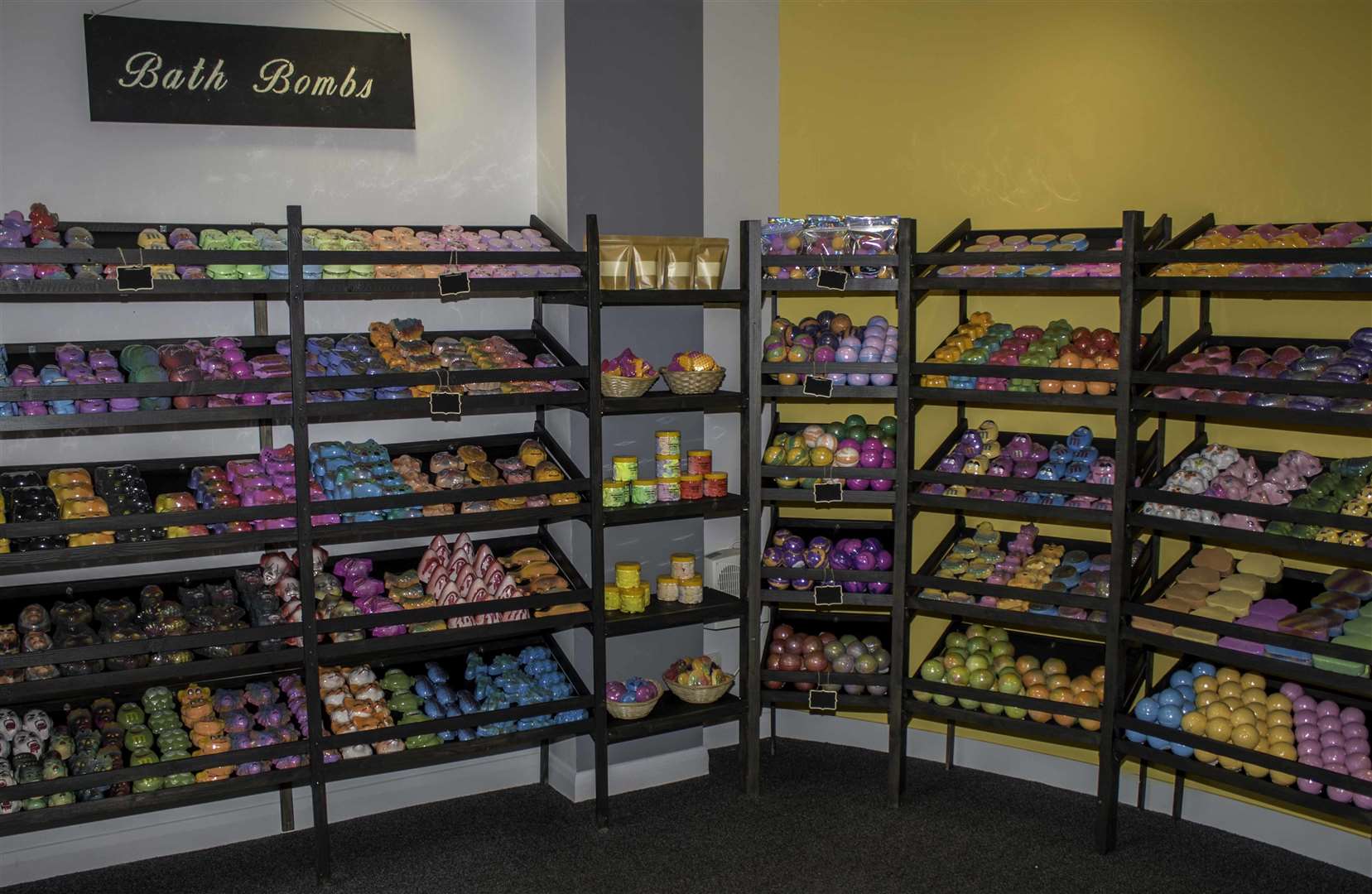 Bath bombs are joined by creams, scrubs, melts and candles on the shelves at Bath Bomb Boom