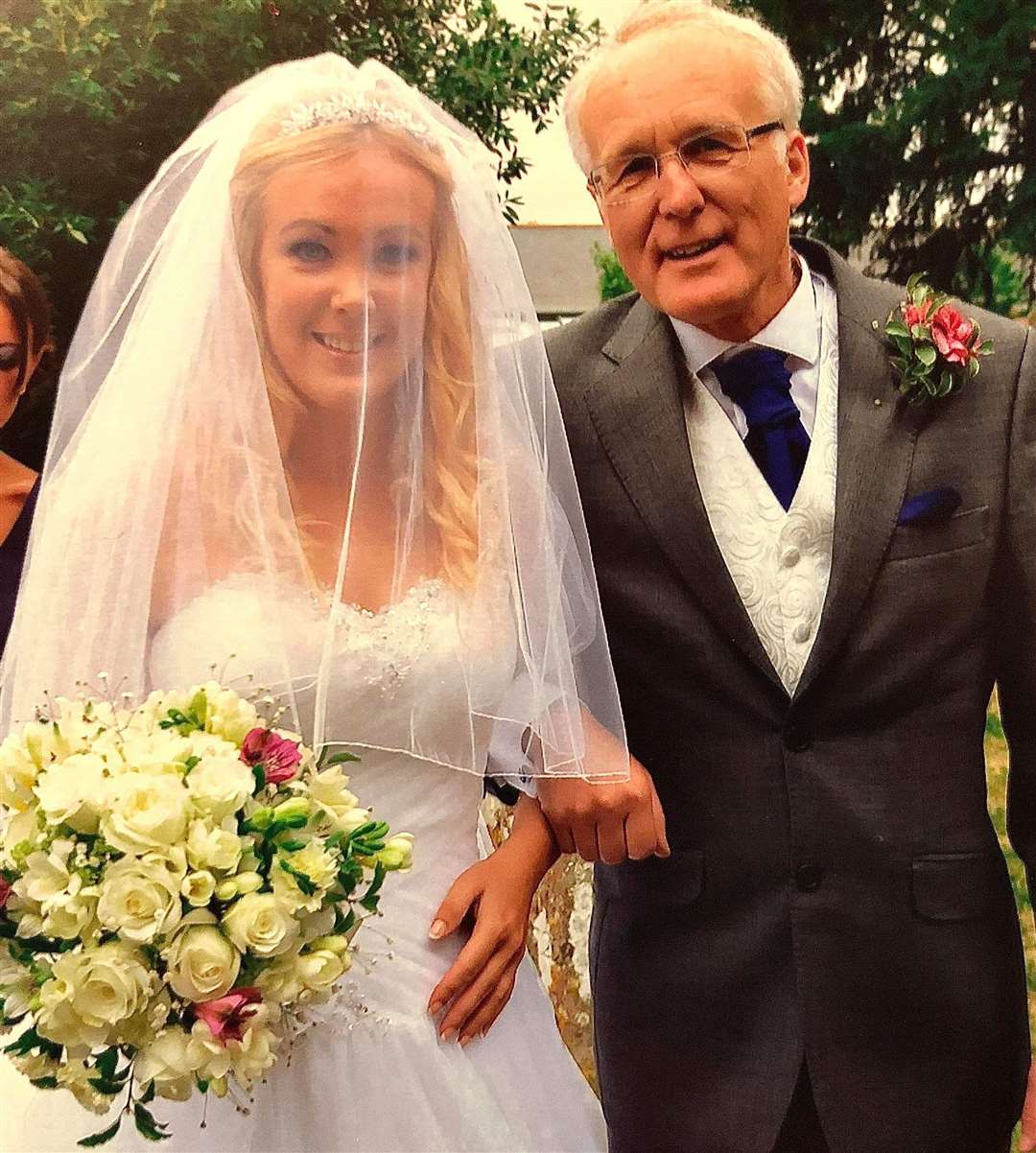Clive Flisher with his daughter Nicola on her wedding day. Photo: Nicola Allen