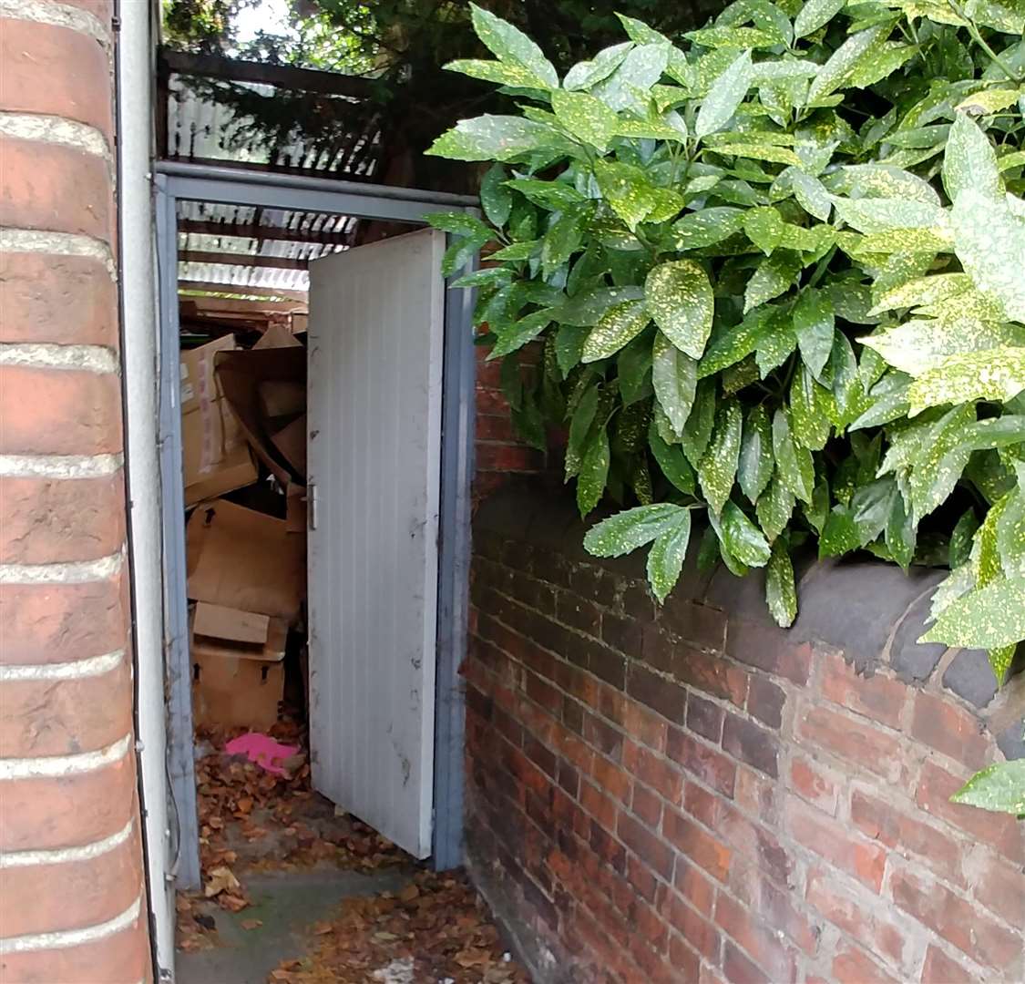 The lean-to filled with waste at the property in Old Dover Road