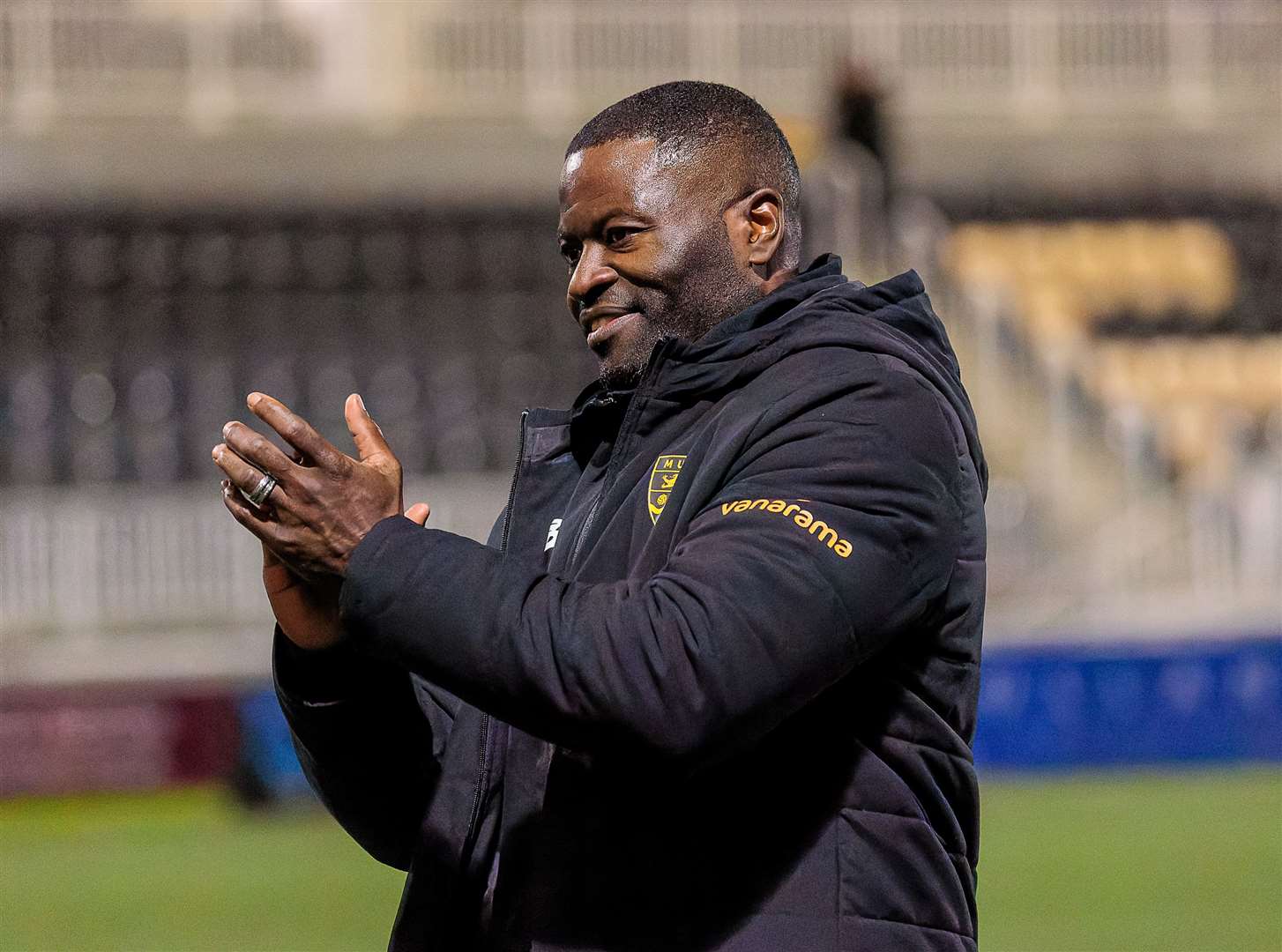 Maidstone manager George Elokobi is staying at the Gallagher until the summer of 2026. Picture: Helen Cooper