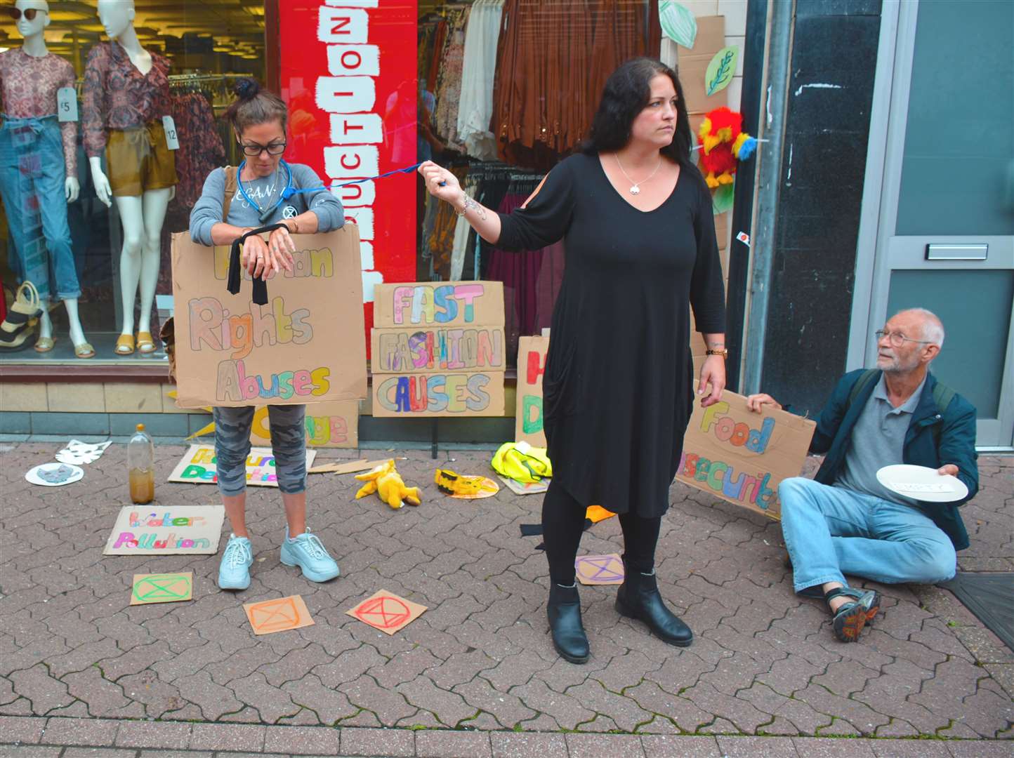 Protesters outside Primark in Dartford, warning shoppers of 'fast fashion'. Picture: Dominic Honey