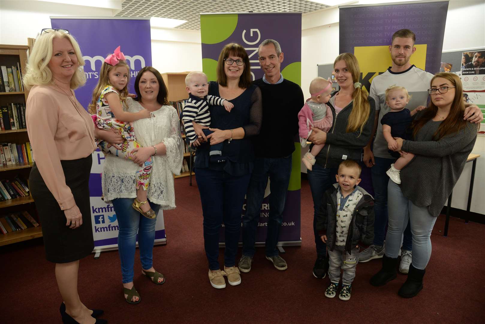 Centre Manager Debra Carey with the winners and their parents in the Cute Kids competition at the presentation at the Orchard Centre