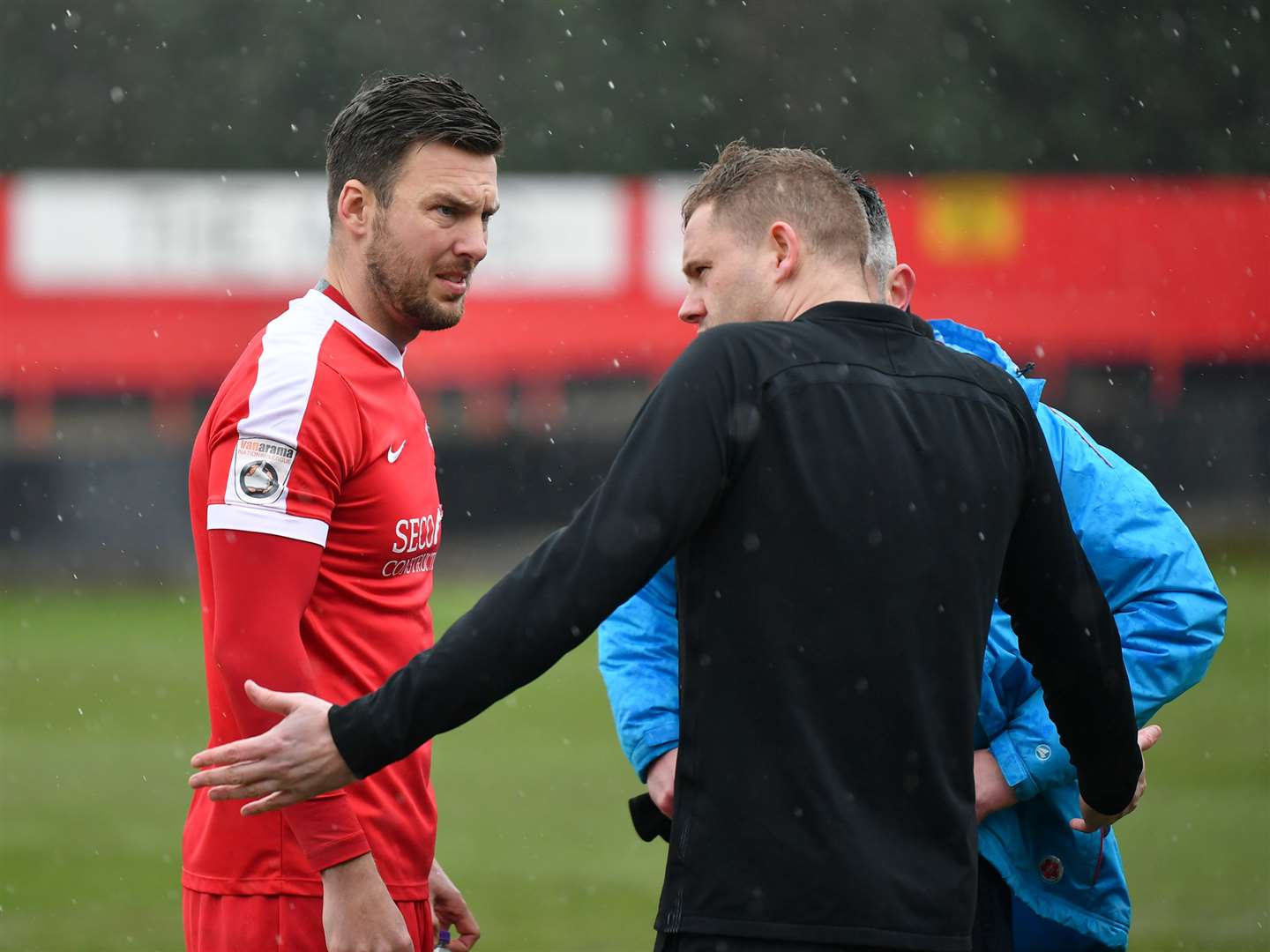 Ref Rob Whitton explains his decision to both managers. Picture: Keith Gillard