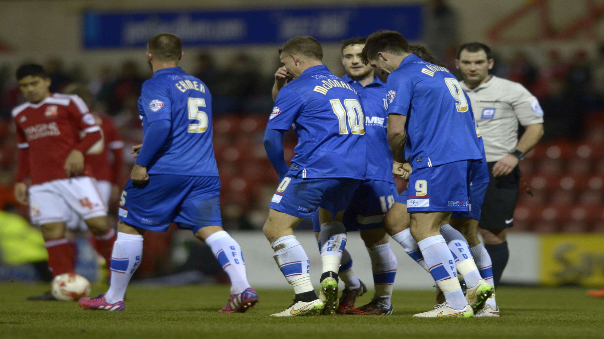 Cody McDonald celebrates his opening goal at Swindon Picture: Barry Goodwin