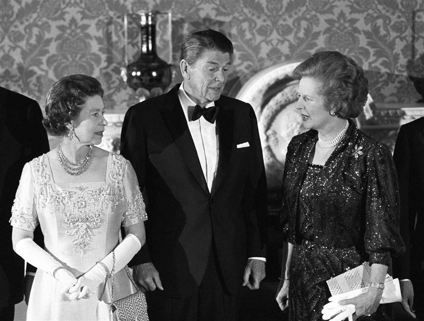 The Queen, US president Ronald Reagan and Margaret Thatcher at a Buckingham Palace banquet in 1984 (PA)