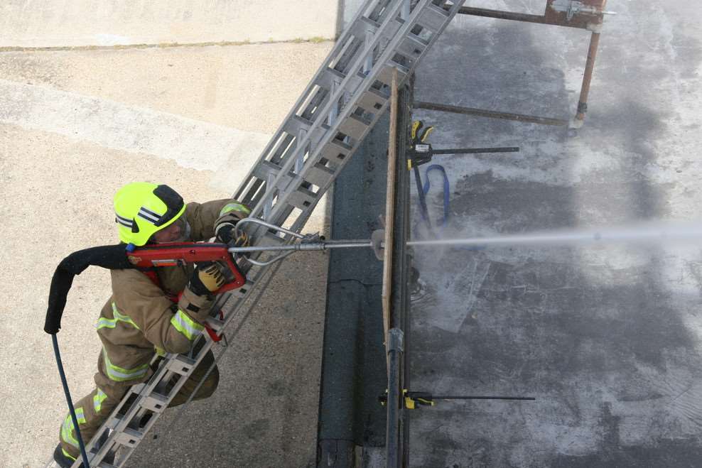 Firefighters used cobra cold cutting equipment to cut through the shipping container. Picture: stock image of cobra from KFRS.