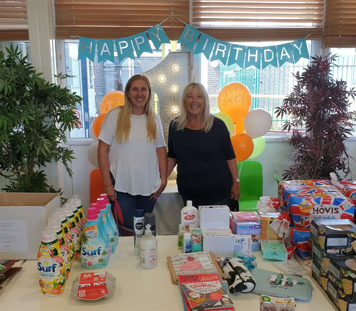 Two happy shoppers at the supermarket's 1st birthday - mother and daughter Pauline and Michelle Michel